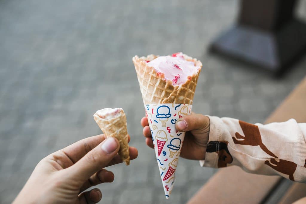 Little and large half-eaten Cornetto ice-creams