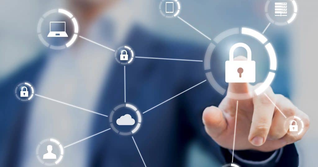 blurred businessman pointing at padlock